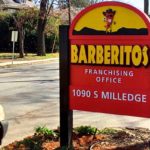 Roadside post and panel sign for Barberitos Office in Athens, GA