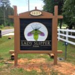 Custom outdoor wood sign for Lady Slipper Farm