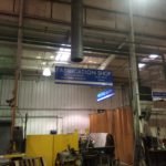 Indoor directional sign for manufacturing business