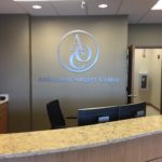 Indoor office sign routed from metal